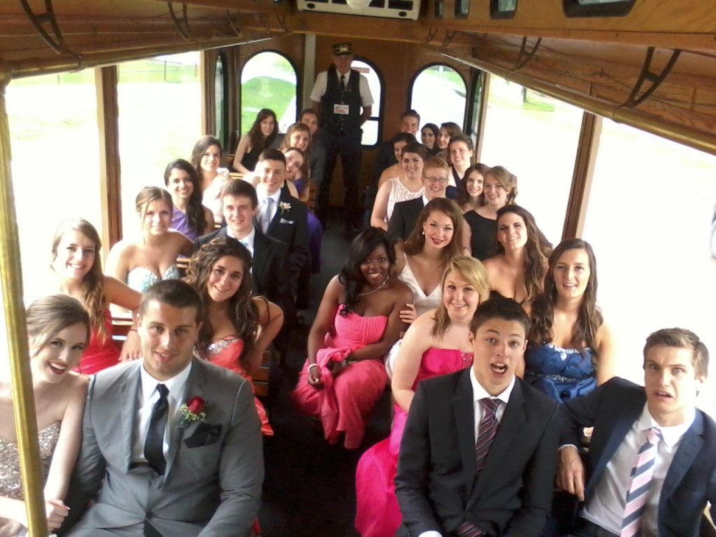 Graduation group riding inside the trolley