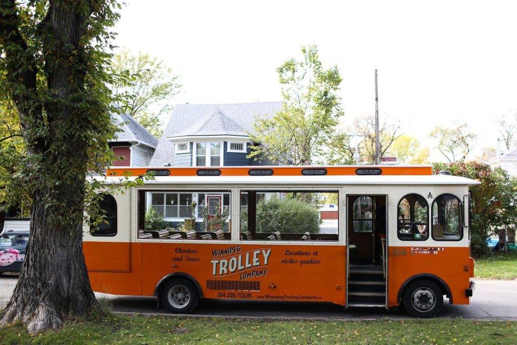 Winnipeg Trolley outside a heritage home on a wedding day